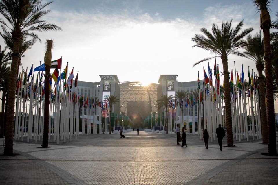Participants arrive at Expo Dubai, the venue for Cop28 (EPA)