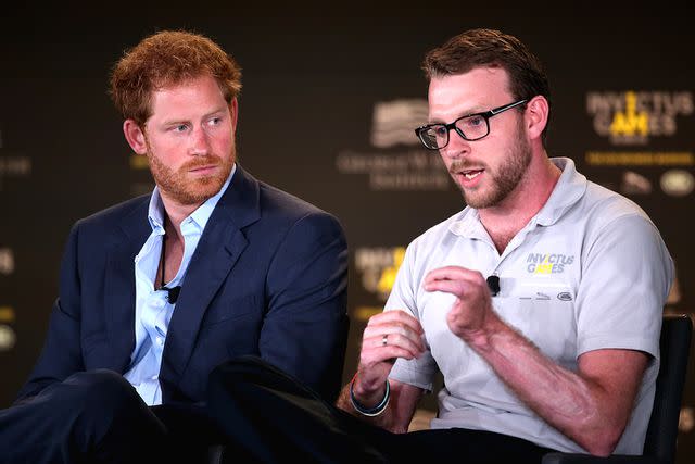 <p>Chris Jackson/Getty</p> Prince Harry and JJ Chalmers at the Invictus Games in Orlando, Florida in May 2016.