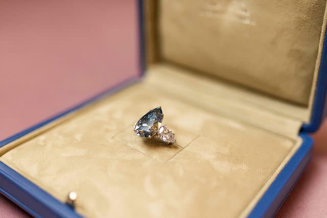 <p>PIERRE ALBOUY/AFP via Getty Images</p> The gem has become the most expensive diamond sold in history