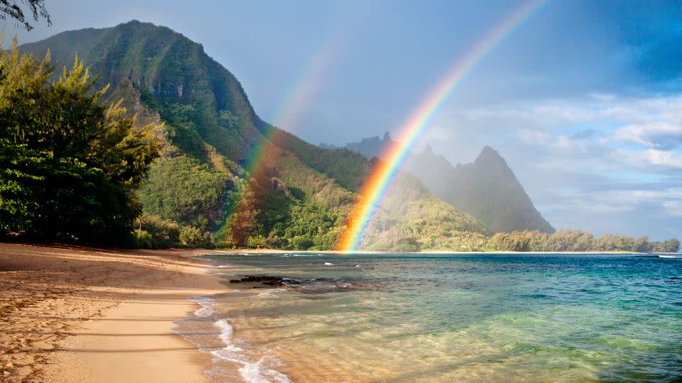 Travel adviser Marilyn Clark, a Hawaii specialist, usually visits the state in the fall after the summer crowds have gone. It's a good time to see rainbows, like this double stunner at Tunnels Beach on Kauai. - M Swiet Productions/Moment RF/Getty Images