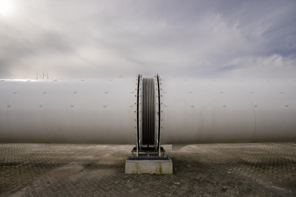A joint, allowing expansion in heat and contraction in cold, connects tubes at a new European test center for hyperloop transportation technology which opens in Veendam, northern Netherlands, Tuesday, March 26, 2024. (AP Photo/Peter Dejong)