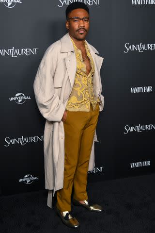 <p>Alberto Rodriguez/WWD via Getty</p> Donald Glover