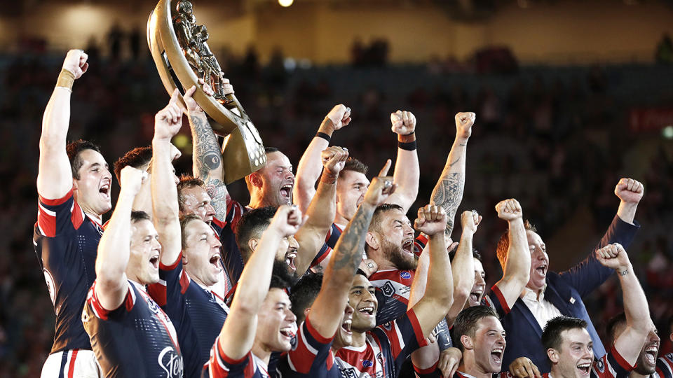 The Sydney Roosters are pictured celebrating their 2019 NRL premiership, after defeated the Canberra Raiders.