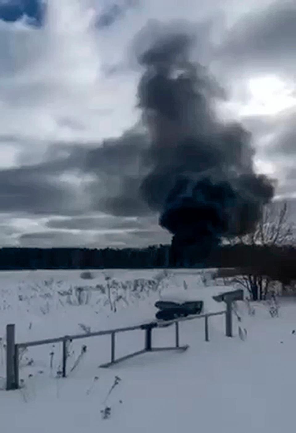 Smoke rises from a crashed Russian military Il-76 transport plane outside Ivanovo, Russia (AP)