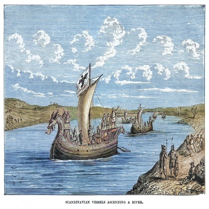 viking ships coming up a river