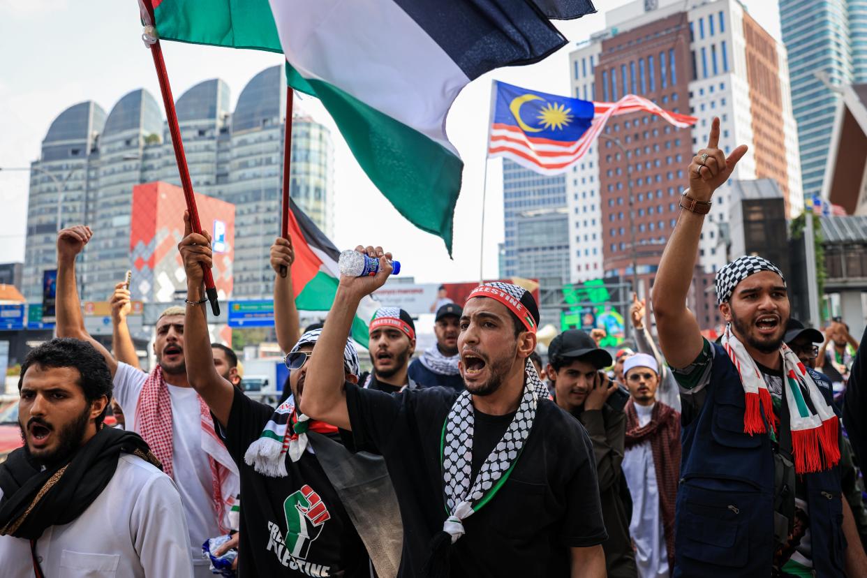Palestinians living in Malaysia gather to protest in solidarity in the wake of the conflict between Israel and Hamas (Getty Images)