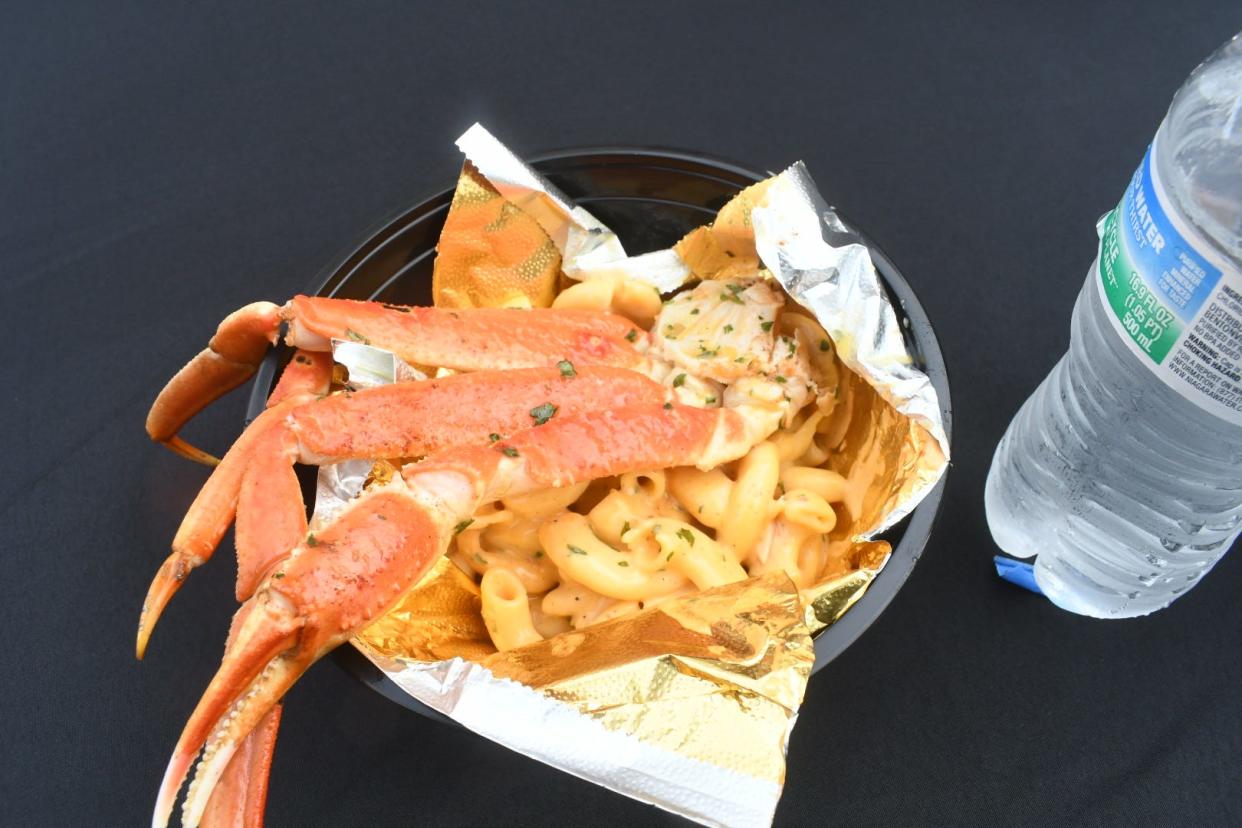 Dinner on the Bricks was held Thursday in downtown Alexandria as part of Alex River Fete Weekend. Food vendors included Sweet Latte Treat & Espresso Bar which served crab flavored mac n' cheese topped with crab legs.