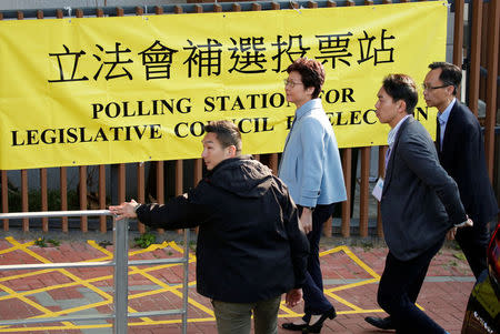 Hong Kong Chief Executive Carrie Lam arrives at a polling station to vote during a Legislative Council by-election in Hong Kong, China March 11, 2018. REUTERS/Bobby Yip