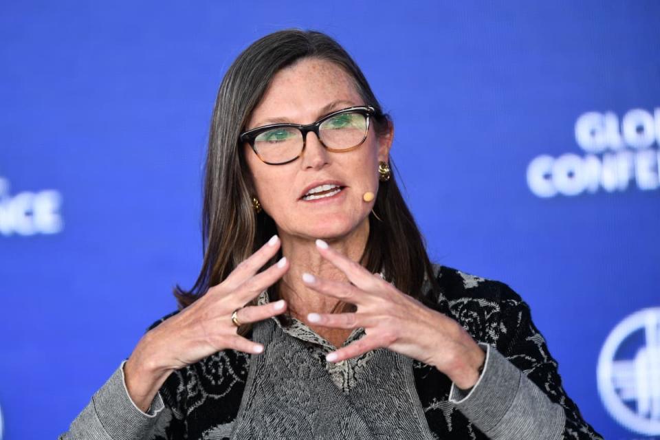 Cathie Wood, chief executive officer and chief investment officer of ARK Invest, speaks during the 2022 Milken Institute Global Conference in California. Her firm, ARK Invest, bought millions of dollars worth of Tesla shares over the past week. 