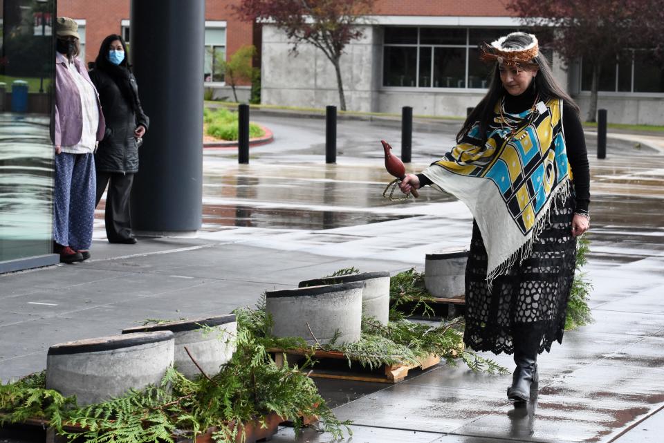 Cynthia Savini, director of the Suquamish Tribe's early learning center, hosted a blessing at an event celebrating the installation of Lushootseed language markers on Olympic College's campus in Bremerton on Thursday.