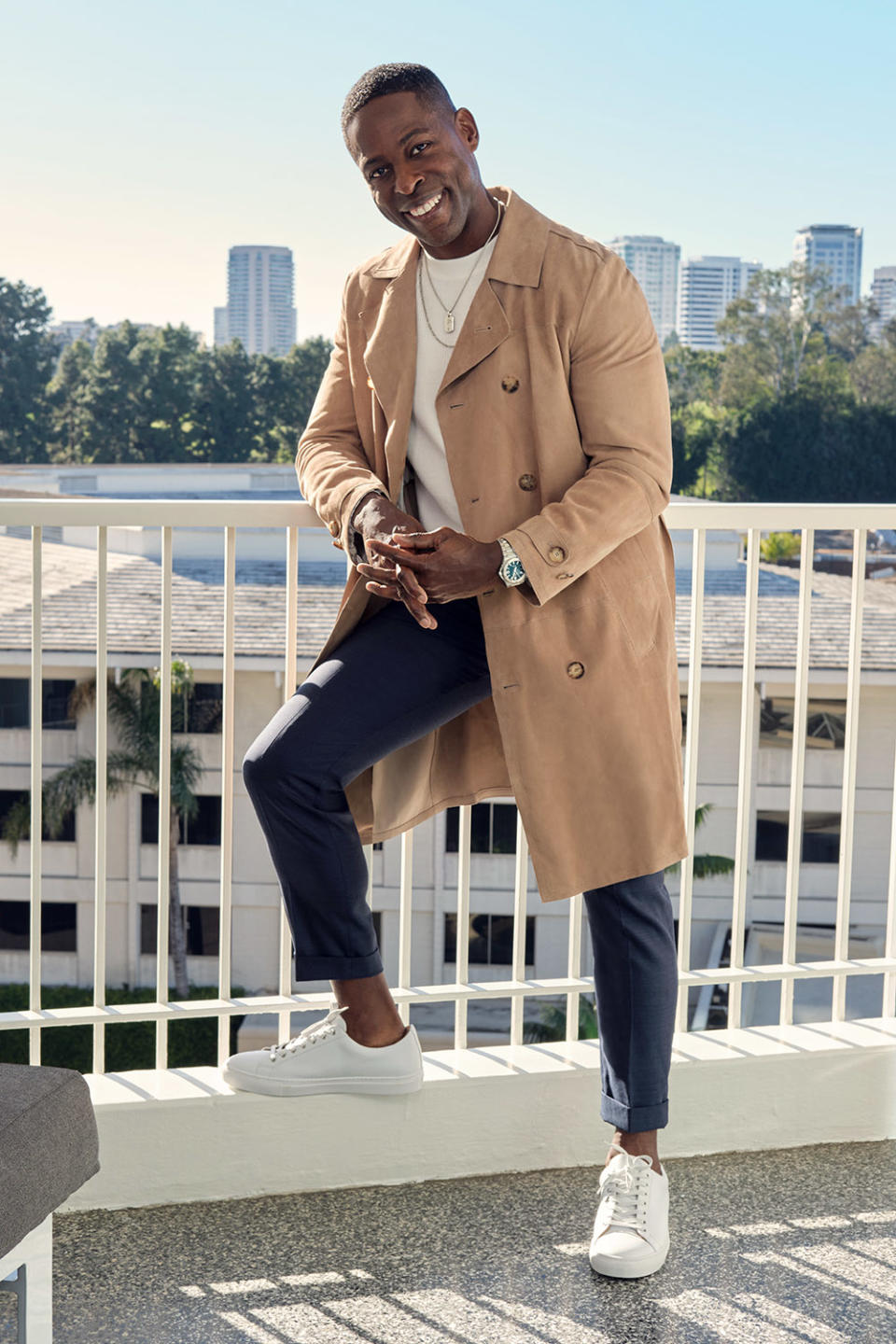 Brown, who prefers clothes that have a “certain level of timelessness” to them, is wearing a suede trench coat, sweater and pants by Brunello Cucinelli, Thursday Boot Company sneakers, an IWC Ingenieur watch and two necklaces by David Yurman, one of which is engraved with his initials.
