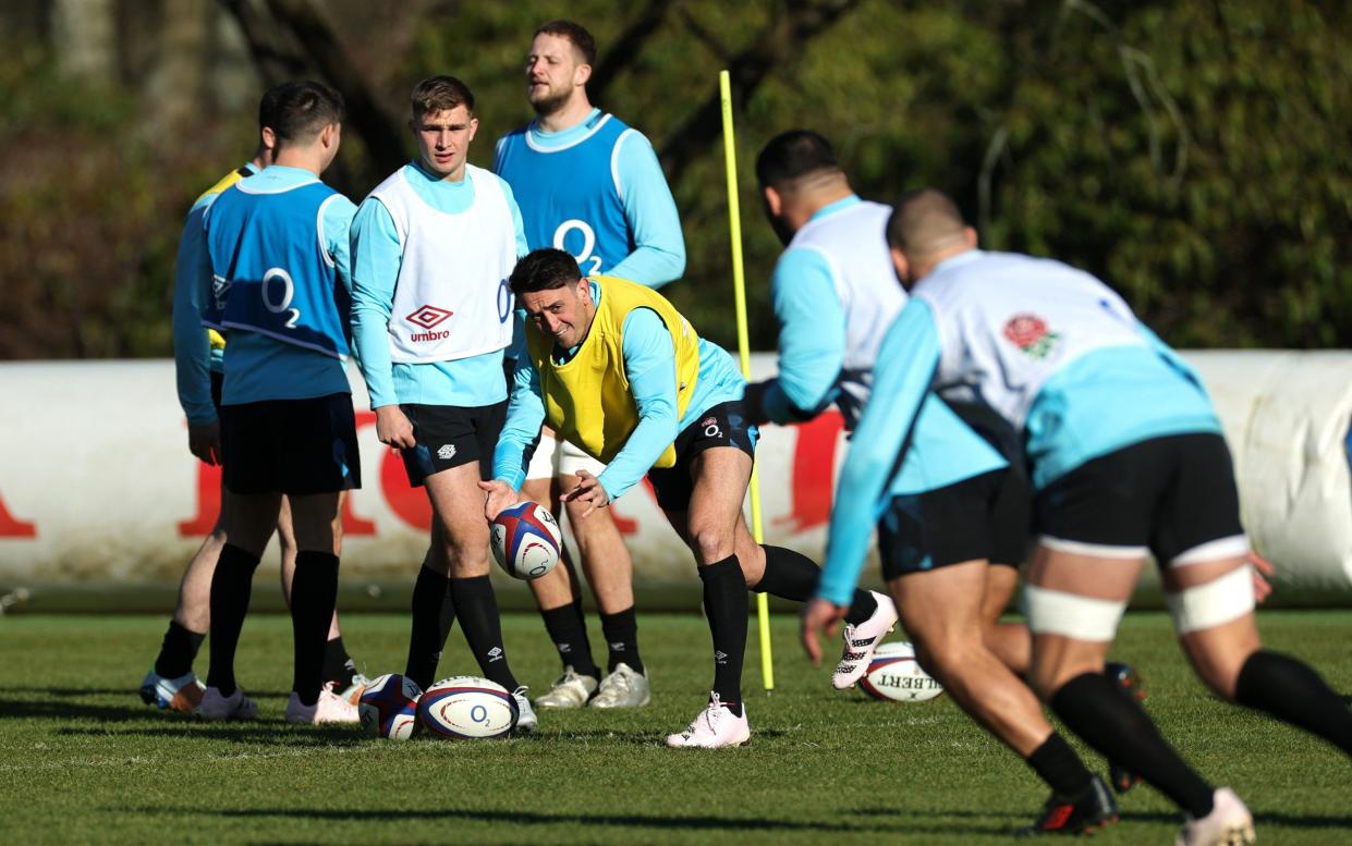 Alex Mitchell passes the bal to his backs during England training - David Rogers/Getty Images