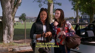 Brenda from Scary movie saying, "She is as fake as press-on nails"