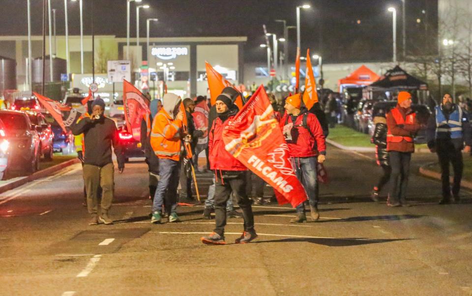 Amazon workers have gathered outside the fulfilment centre in Coventry, where they are on strike