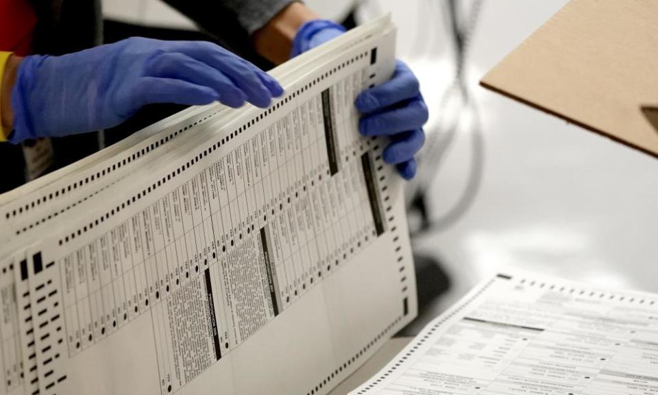 Officials count ballots at the Maricopa county recorder’s office in Phoenix, Arizona, on 4 November 2020.