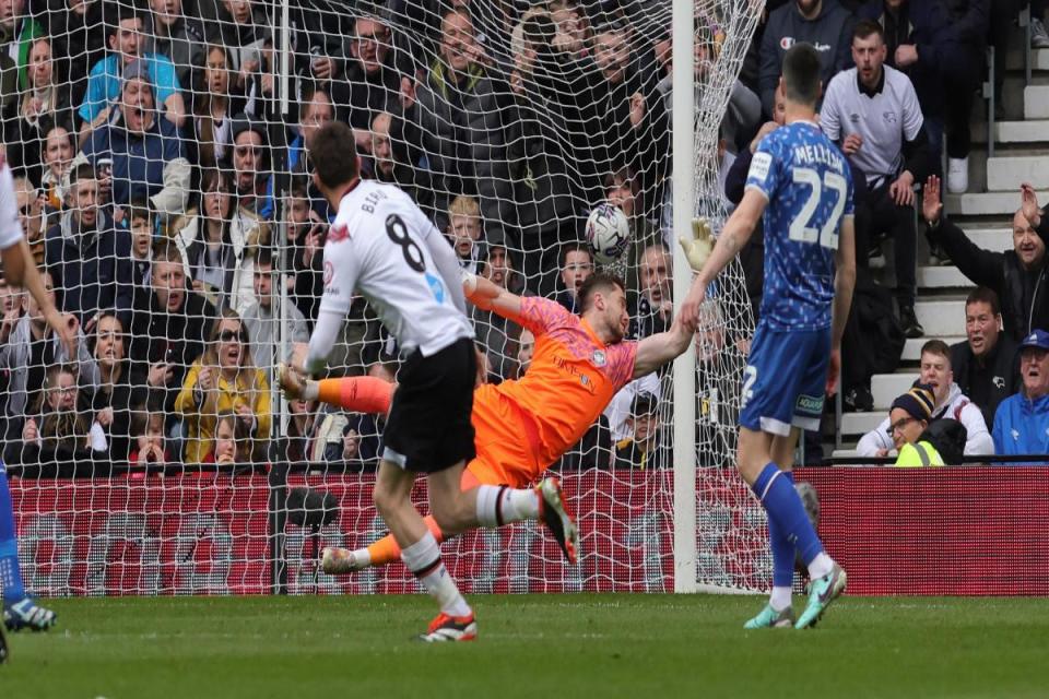 Max Bird fires Derby's early opener past United keeper Harry Lewis <i>(Image: Richard Parkes)</i>