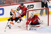 Apr 16, 2016; Washington, DC, USA; Washington Capitals goalie Braden Holtby (70) prepares to make a save on Philadelphia Flyers center Brayden Schenn (10) as Capitals center Evgeny Kuznetsov (92) defends in the third period in game two of the first round of the 2016 Stanley Cup Playoffs at Verizon Center. The Capitals won 4-1, and lead the series 2-0. Mandatory Credit: Geoff Burke-USA TODAY Sports