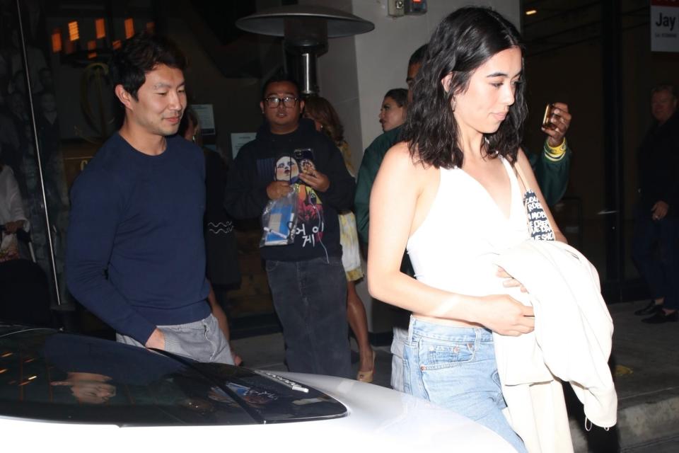 West Hollywood, CA - *EXCLUSIVE* - 'Shang-Chi' star Simu Liu keeps it casual as he steps out for a late dinner at Catch LA with a mystery date in West Hollywood. Pictured: Simu Liu BACKGRID USA 19 JUNE 2022 BYLINE MUST READ: HEDO / BACKGRID USA: +1 310 798 9111 / usasales@backgrid.com UK: +44 208 344 2007 / uksales@backgrid.com *UK Clients - Pictures Containing Children Please Pixelate Face Prior To Publication*