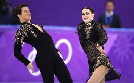 Figure Skating - Pyeongchang 2018 Winter Olympics - Ice Dance short dance competition - Gangneung Ice Arena - Gangneung, South Korea - February 19, 2018 - Tessa Virtue and Scott Moir of Canada perform. REUTERS/Phil Noble