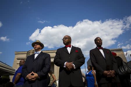 Demonstrators rally at city hall in Baltimore, Maryland May 3, 2015. REUTERS/Eric Thayer