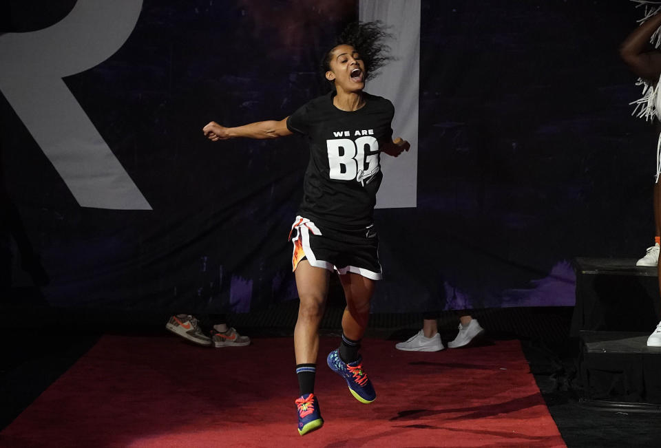 Phoenix Mercury's Skylar Diggins-Smith wears a T-shirt referring to teammate Brittney Griner as she is introduced before a WNBA basketball game against the Las Vegas Aces, Friday, May 6, 2022, in Phoenix. Griner has been detained in Russia since Feb. 17 after authorities at the Moscow airport said they found vape cartridges that allegedly contained oil derived from cannabis in her luggage. (AP Photo/Darryl Webb)