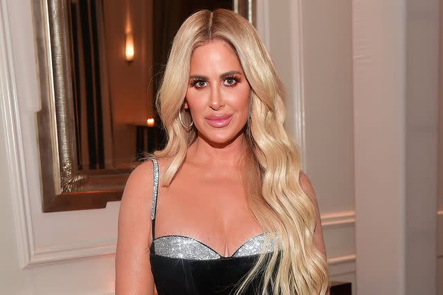 <p>Prince Williams/Wireimage</p> Kim Zolciak is pictured attending the Gucci Mane Black Tie Gala at St. Regis Atlanta on February 13, 2020 in Atlanta, Georgia.