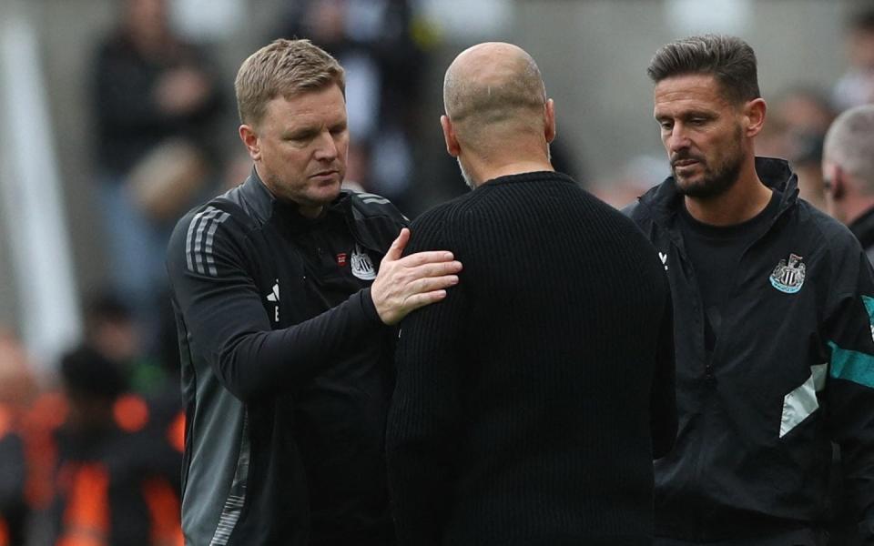 Newcastle, Britain - September 28, 2024 Newcastle United manager Eddie Howe with Manchester City manager Pep Guardiola