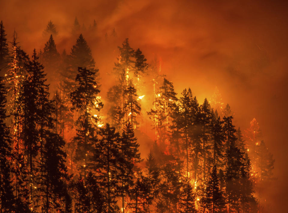 <p>This Monday, Sept. 4, 2017, photo provided by KATU-TV shows a wildfire as seen from near Stevenson Wash., across the Columbia River, burning in the Columbia River Gorge above Cascade Locks, Ore. (Photo: Tristan Fortsch/KATU-TV via AP) </p>