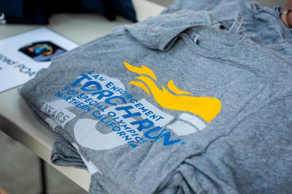 Shirts for sale in Bob Hart Square prior to the Law Enforcement Torch Run for Special Olympics Northern California in Merced, Calif., on Thursday, June 15, 2023. Andrew Kuhn/akuhn@mercedsun-star.com