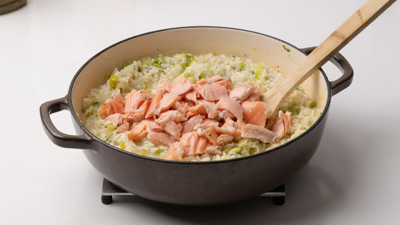 adding salmon to risotto