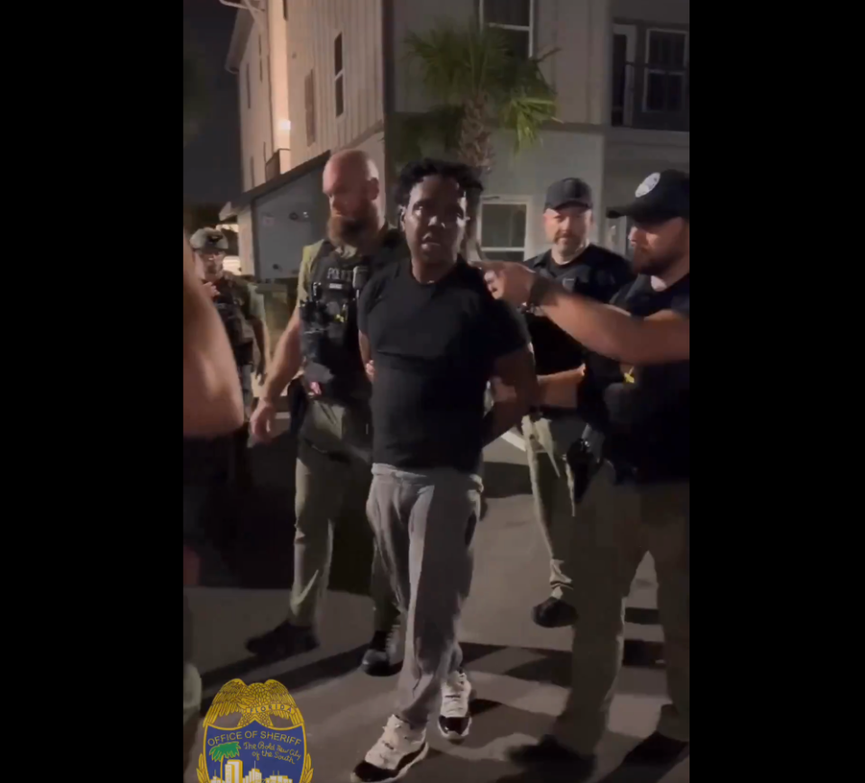 Rashad Murphy is taken into custody early Tuesday, July 30, 2024, at an apartment complex off Collins Road and Interstate 295 in Jacksonville. He is the fourth suspected arrested in the shooting death of rapper Julio Foolio in Tampa.
