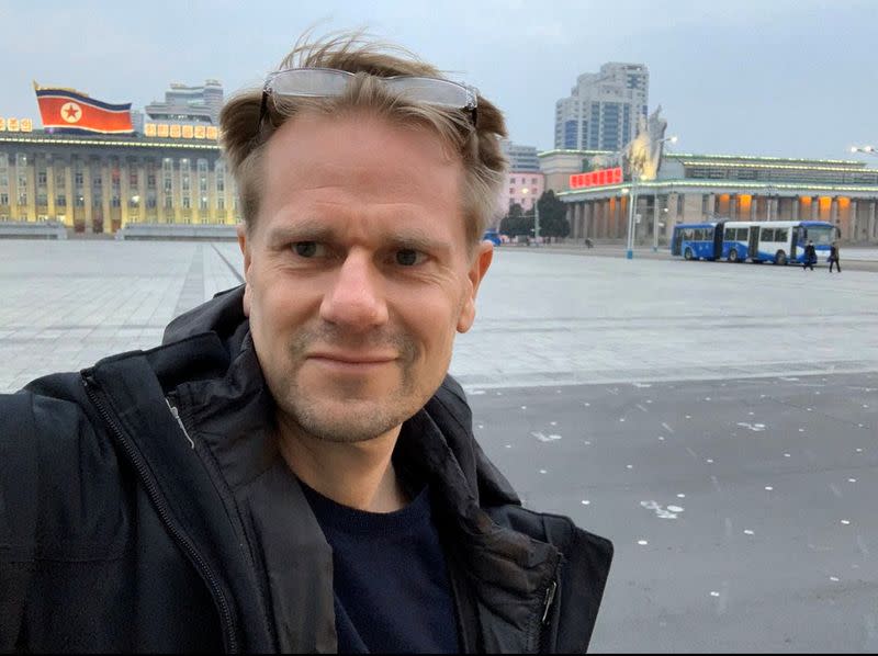 Swedish ambassador to North Korea Joachim Bergstrom poses for a selfie photo standing in Pyongyang's Kim Il Sung Square