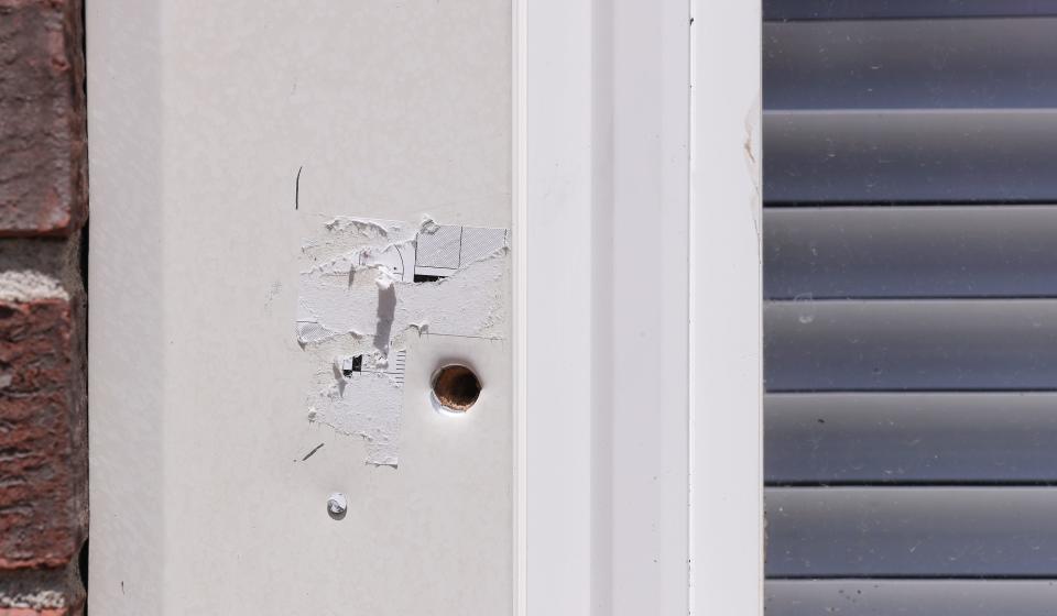 A bullet hole was still visible outside an apartment complex in Louisville, Ky. on May 25, 2020.  Breonna Taylor was killed by police officers who were issuing a no-knock warrant at the apartment as she and her boyfriend slept. 