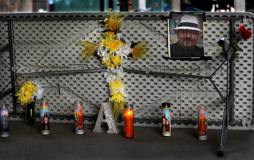 A memorial created by family and friends sits in the breezeway of the Kennewick apartment building on North Tweedt Street where Arthur Amaya was shot to death. Herald/Bob Brawdy/bbrawdy@tricityherald.com