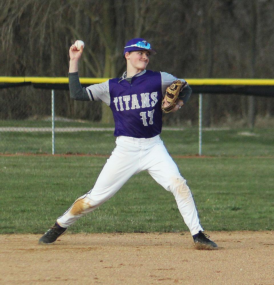 El Paso-Gridley shortstop Landon Foster fires the ball to first base during Monday's nonconference baseball game with Pontiac at South Pointe Park. PTHS prevailed 12-0.
