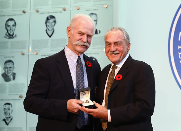 TORONTO, ON - NOVEMBER 11: (L-R) Lanny McDonald, Chairman of the Hockey Hall of Fame presents Rogatien Vachon with his Hall ring during a photo opportunity at the Hockey Hall Of Fame on November 11, 2016 in Toronto, Canada. (Photo by Bruce Bennett/Getty Images)