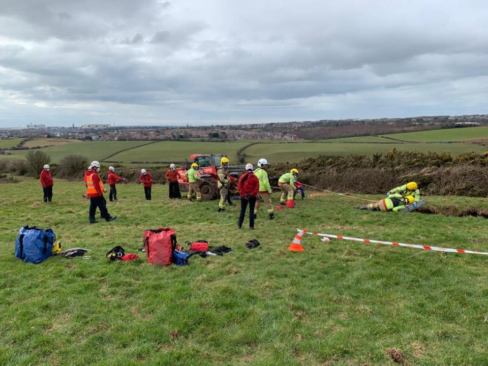 Cumbria Fire and Rescue Service pulled the farmer from the 60ft sinkhole (CFRS/Twitter)