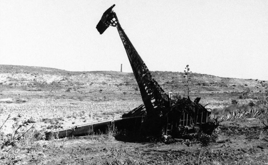 The largest piece remaining of a U.S. jet tanker after its collision with a B52 bomber in Almeria, Spain, Jan. 18, 1966. Two of its crews were killed and the other two listed as missing. (AP Photo)