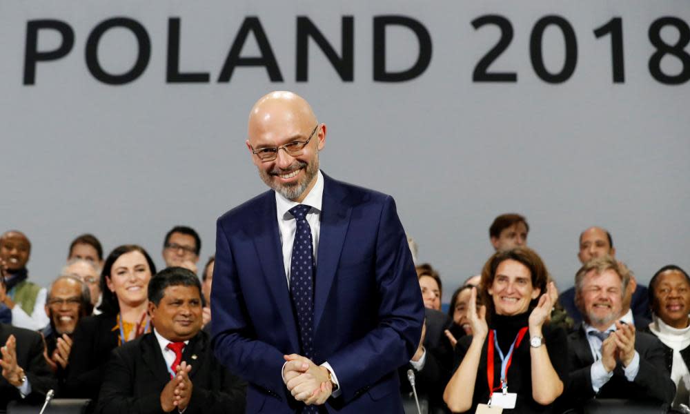 COP24 President Michal Kurtyka smiles after agreement is reached during the closing session in Poland