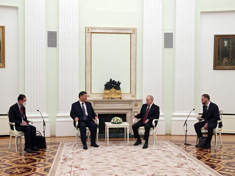 Russian President Vladimir Putin meets with China’s President Xi Jinping at the Kremlin in Moscow on 20 March 2023 (SPUTNIK/AFP via Getty Images)