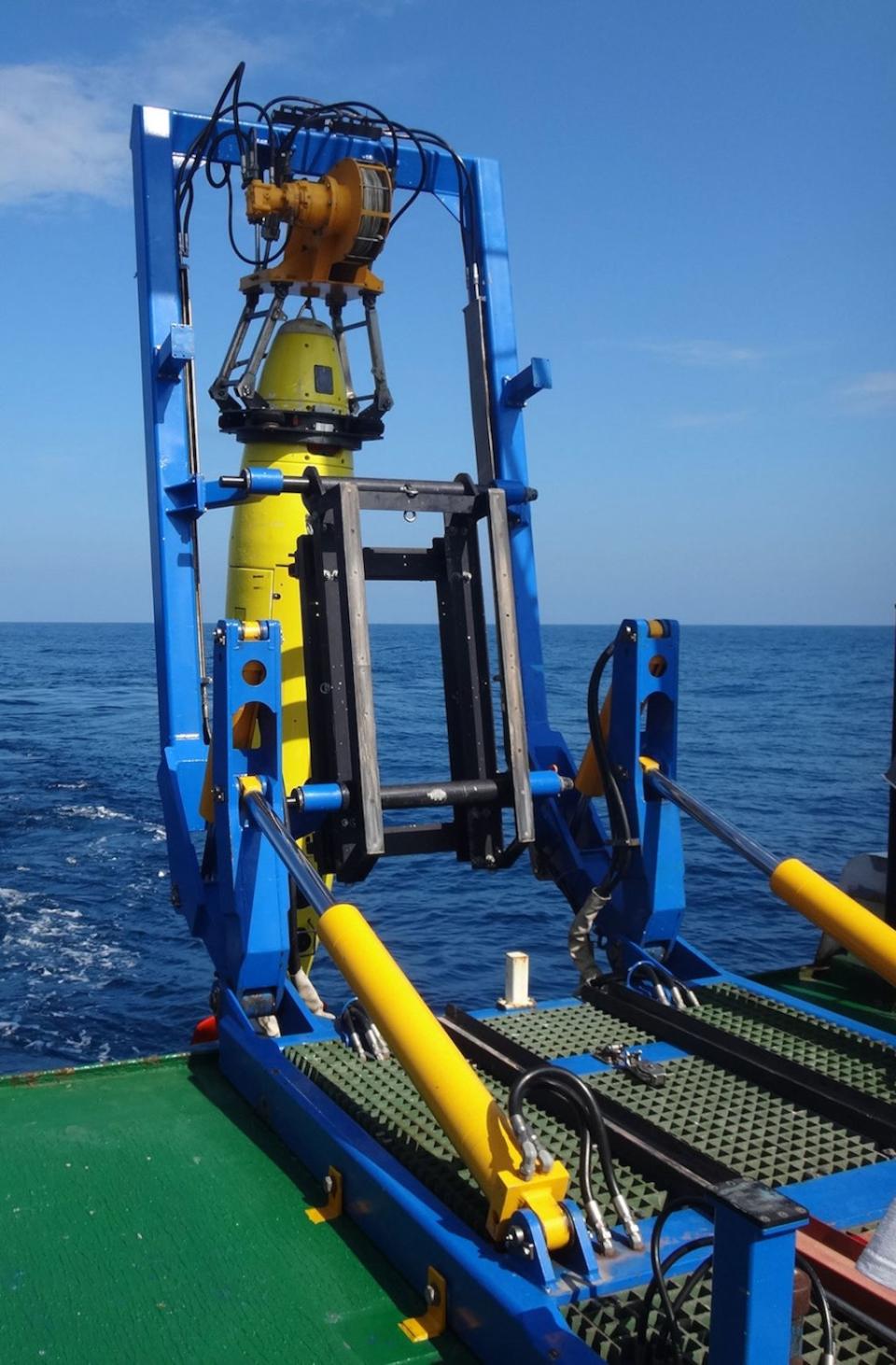 The REMUS 6000 as it is deployed off the Colombian Navy research ship ARC Malpelo. <cite>Mike Purcell, Woods Hole Oceanographic Institution</cite>