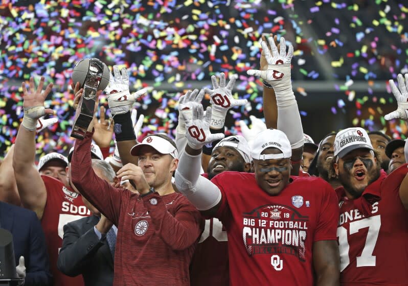 Oklahoma coach Lincoln Riley and the Sooners celebrate after defeating Baylor in the 2019 Big 12 championship