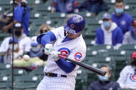 Chicago Cubs' Joc Pederson swings for an RBI single off Pittsburgh Pirates starting pitcher Trevor Cahill in the second inning of a baseball game Friday, May 7, 2021, in Chicago. David Bote scored on the play. (AP Photo/Charles Rex Arbogast)