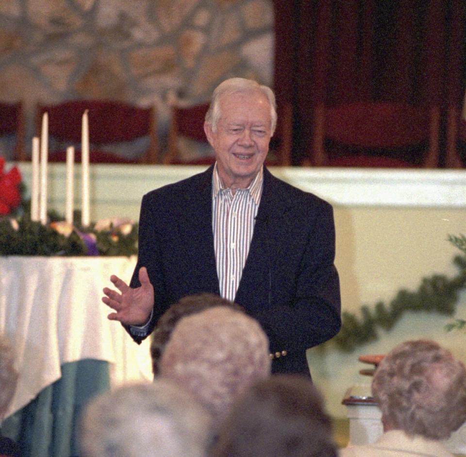 Former President Jimmy Carter teaches Sunday School at Maranatha Baptist Church in his hometown of Plains, Ga., Sunday, December 14, 1997. Carter says he thinks he has taught about 1,600 Sunday school lessons. (AP Photo/Todd Stone)