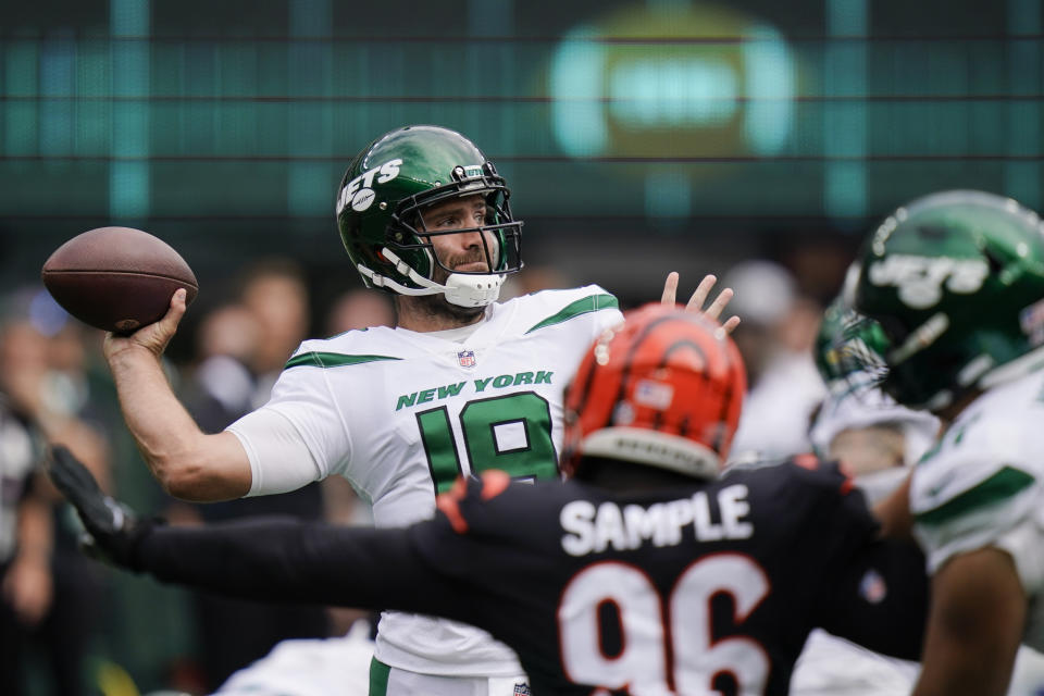 New York Jets quarterback Joe Flacco (19) is rushed by Cincinnati Bengals' Cam Sample (96) during the first half of an NFL football game Sunday, Sept. 25, 2022, in East Rutherford, N.J. (AP Photo/Seth Wenig)