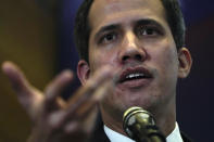 FILE - Opposition leader Juan Guaido explains the income and expenses of his self-proclaimed, parallel government in Caracas, Venezuela, Sept. 16, 2022. Venezuela’s opposition on Thursday, Jan. 5, 2023, has selected an all-female team of exiled former lawmakers to replace Guaido as the face of its efforts to remove socialist President Nicolas Maduro. (AP Photo/Ariana Cubillos, File)