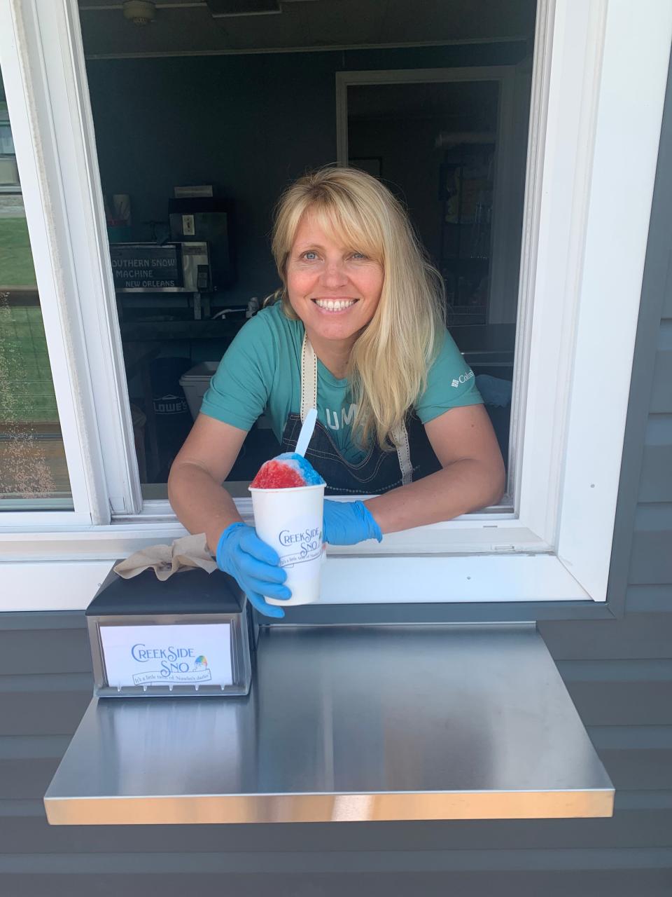 Tracy Heard shows off one of her favorite sno concoctions.