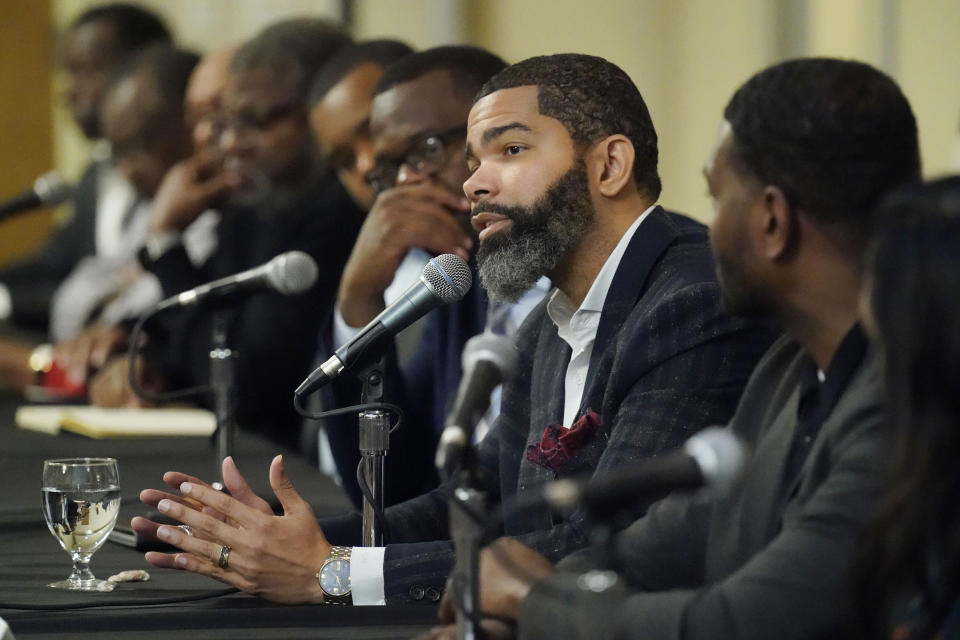 Jackson, Miss., Mayor Chokwe Antar Lumumba responds to a question during a roundtable forum that involved EPA Administrator Michael S. Regan, right, and Jackson-area businesspeople, community leaders, residents and educators, about the efforts underway to deliver a sustainable water system for Jackson residents, Tuesday, Nov. 15, 2022, at Jackson State University, in Jackson, Miss. (AP Photo/Rogelio V. Solis)