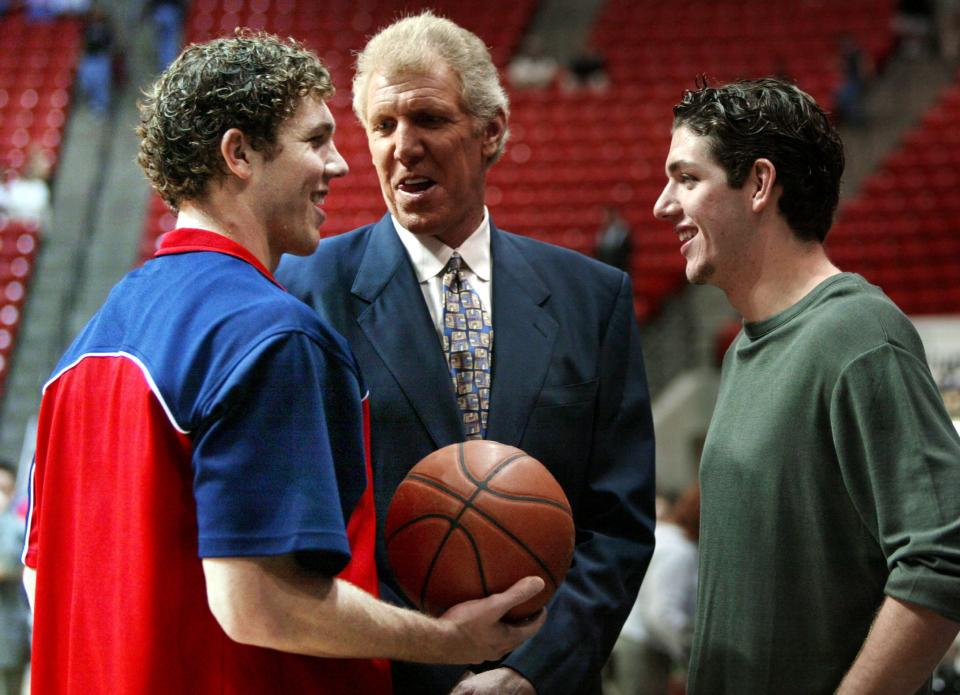 Bill Walton with sons Luke (left), then a player with Arizona and Chris, then a player with San Diego State, in 2002.