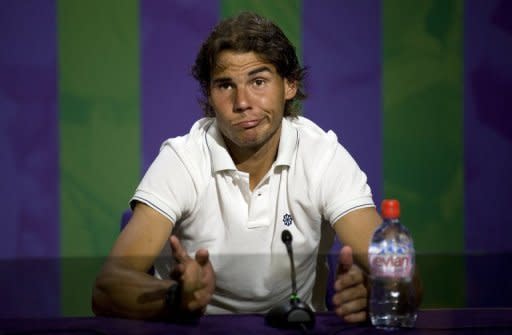 El tenista español Rafael Nadal en una conferencia de prensa el 28 de junio. Nadal anunció el 19 de julio que decidió renunciar a competir en los Juegos Olímpicos de Londres por no encontrarse en buenas condiciones (AFP/Archivo | neil tingle)